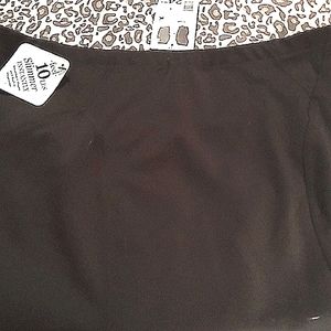 Slimming black pencil skirt with build in shape wear Technology. NWT